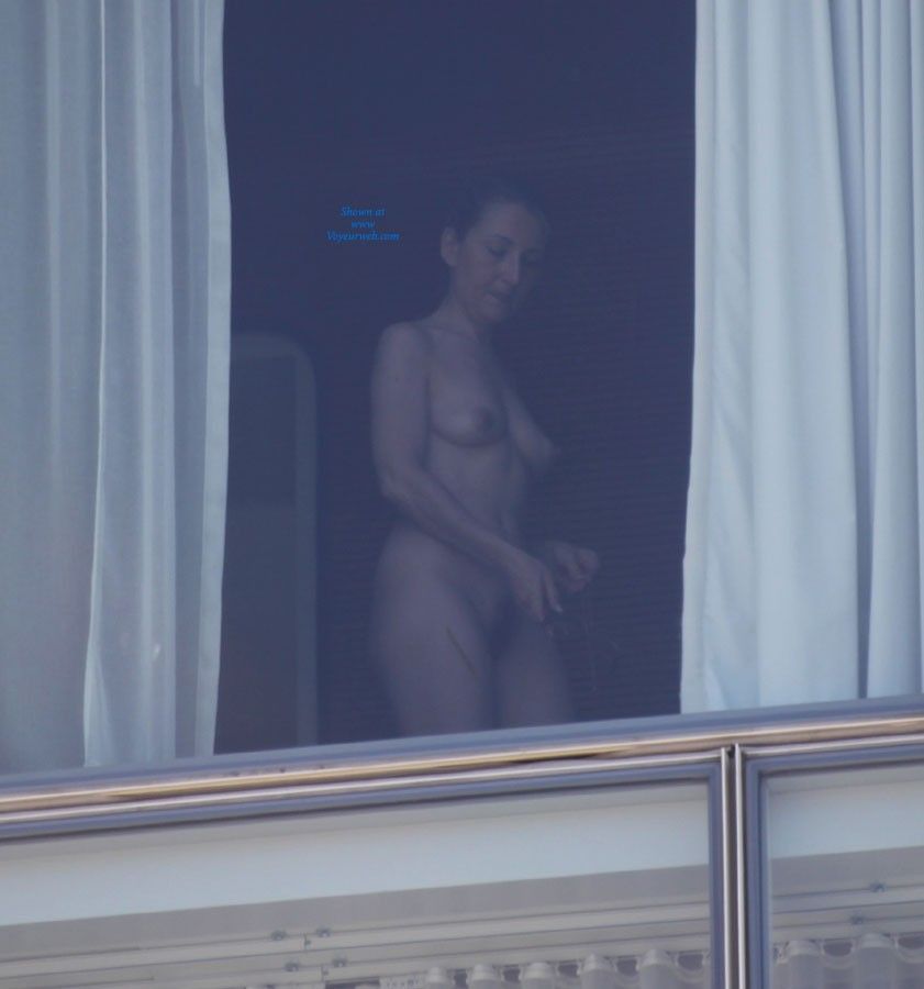 Hotel window exhibitionist image