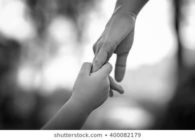 Baby holding adult hand graphic
