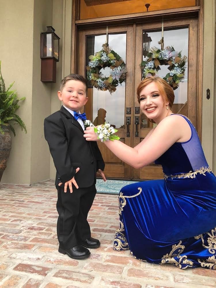 Teen suspended for going to girlfriend s prom