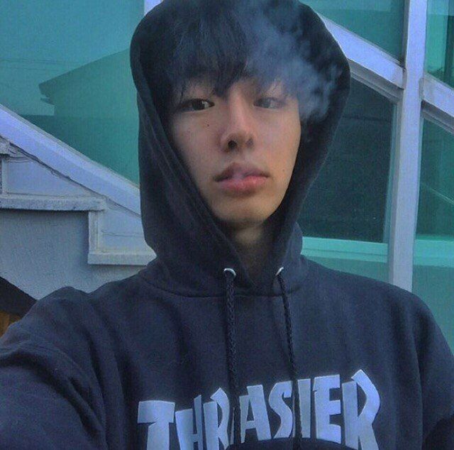 Asian boy smoking